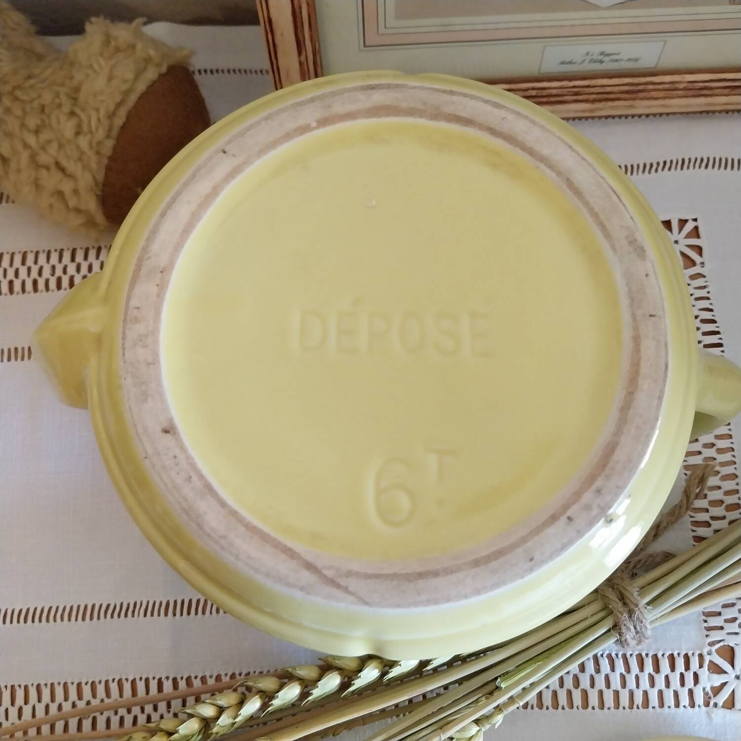 Old yellow earthenware teapot