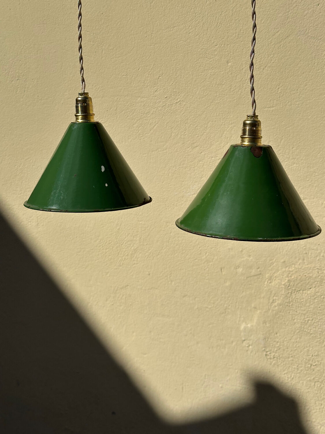 Pair of vintage industrial retro conical enamelled sheet metal pendant lights