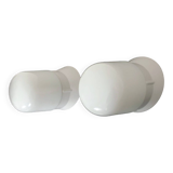 Pair of white oblique wall lights by Arno. 60s