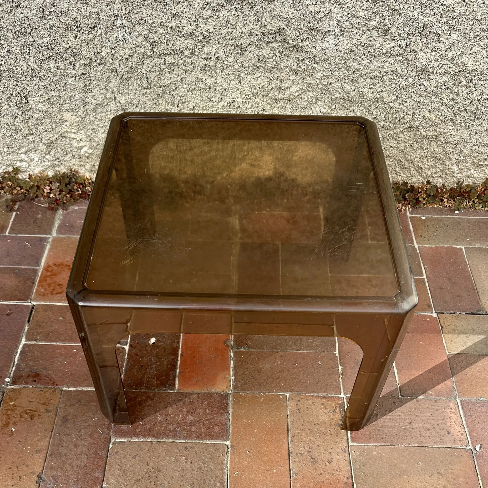 1970s occasional coffee table in smoked Plexiglas by Prisunic