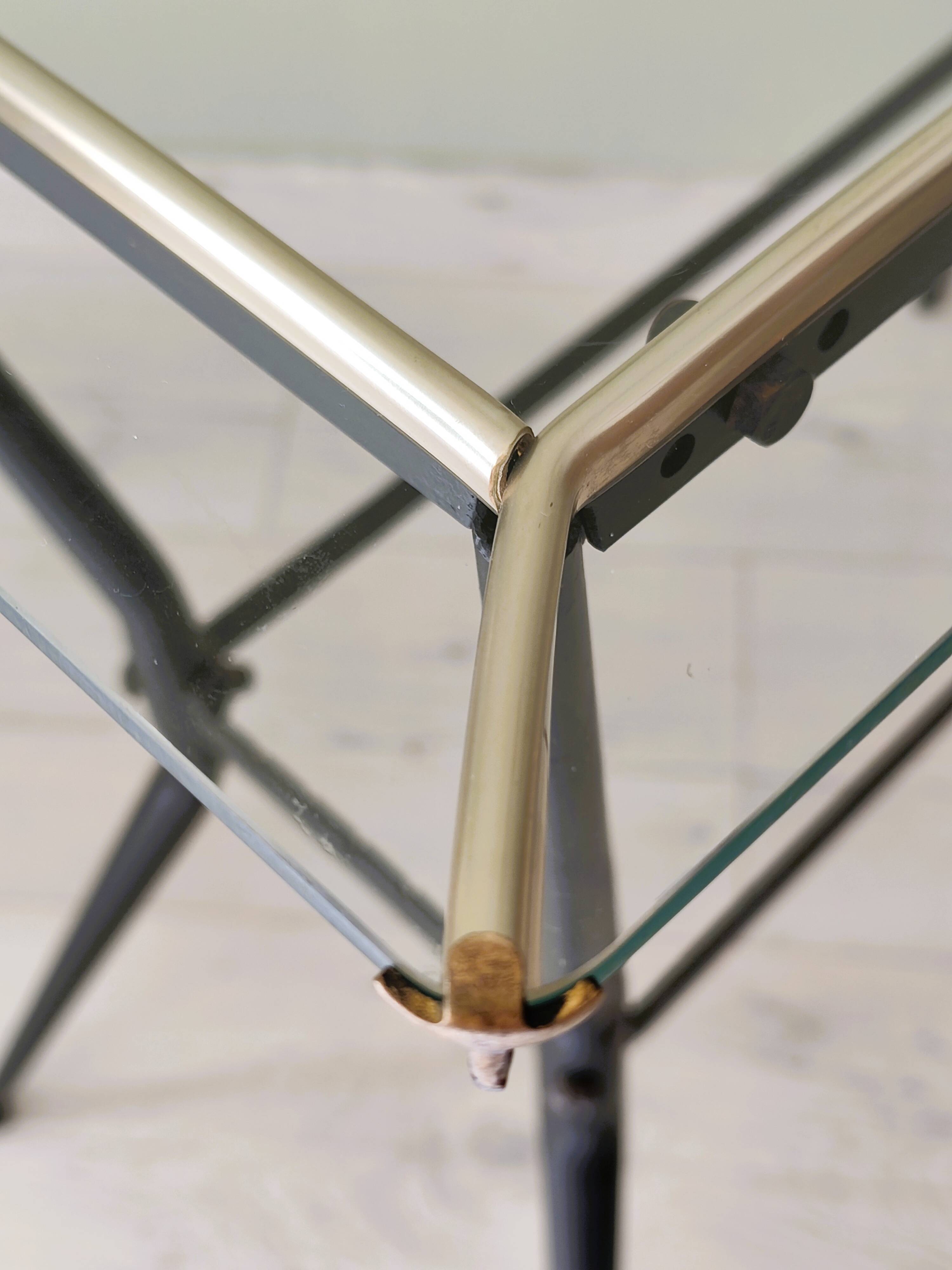 Antique side table made of metal and glass