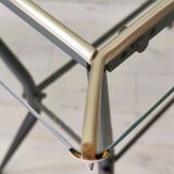 Antique side table made of metal and glass