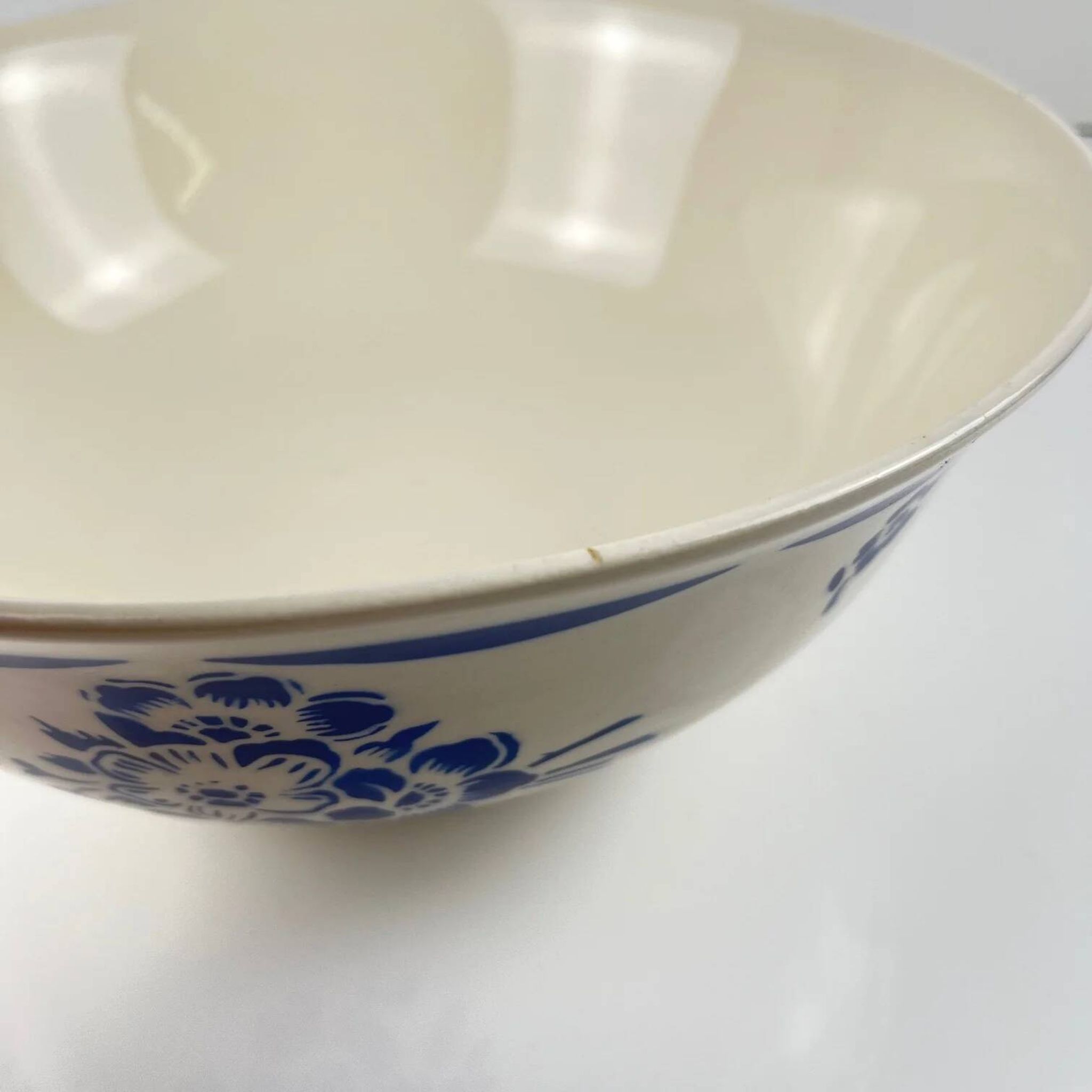 Half-porcelain salad bowl Badonviller, blue flower pattern, early 20th century.