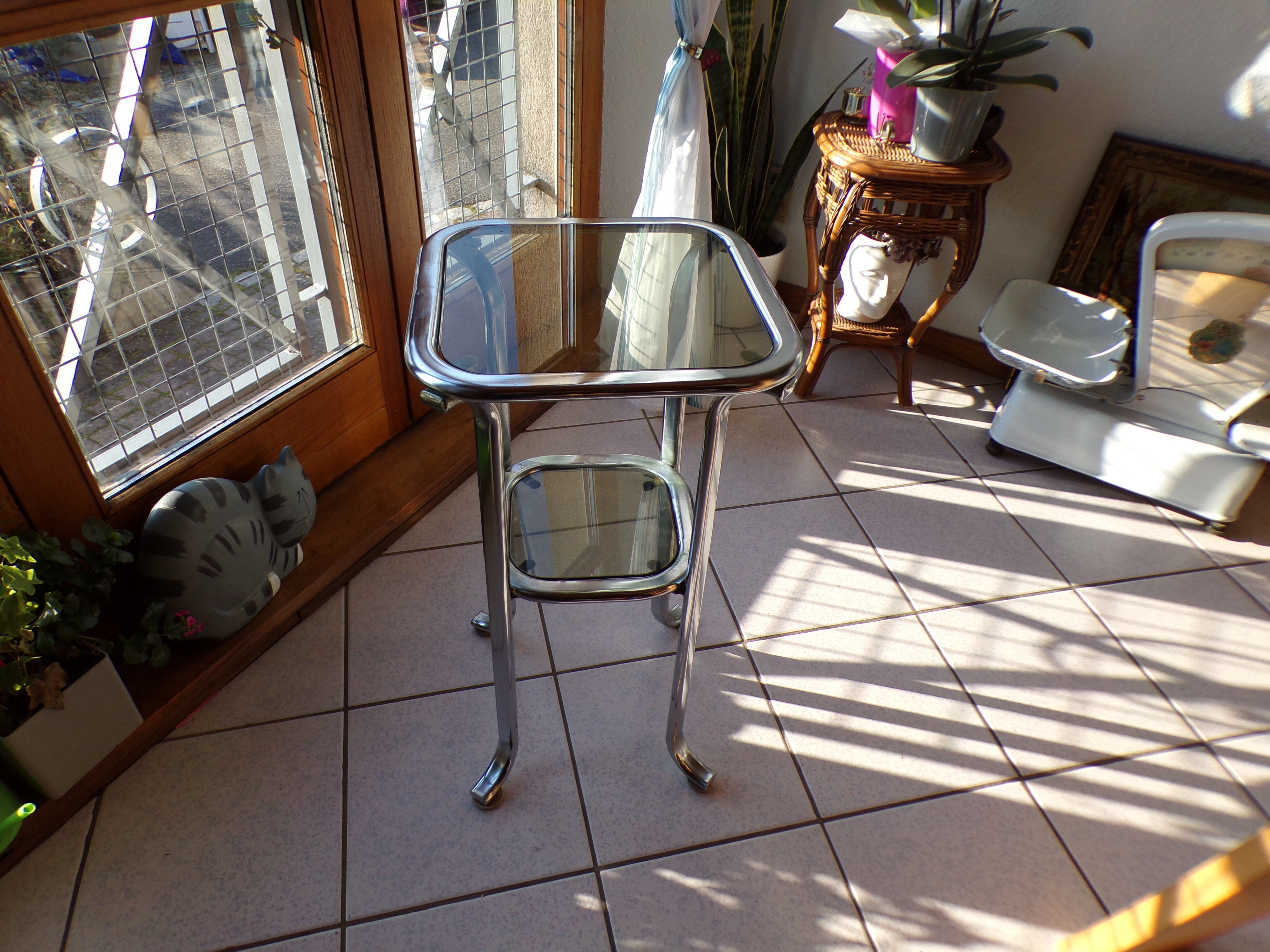 Bedside table or end of tubular steel sofa