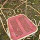 Perforated metal garden chairs and armchairs