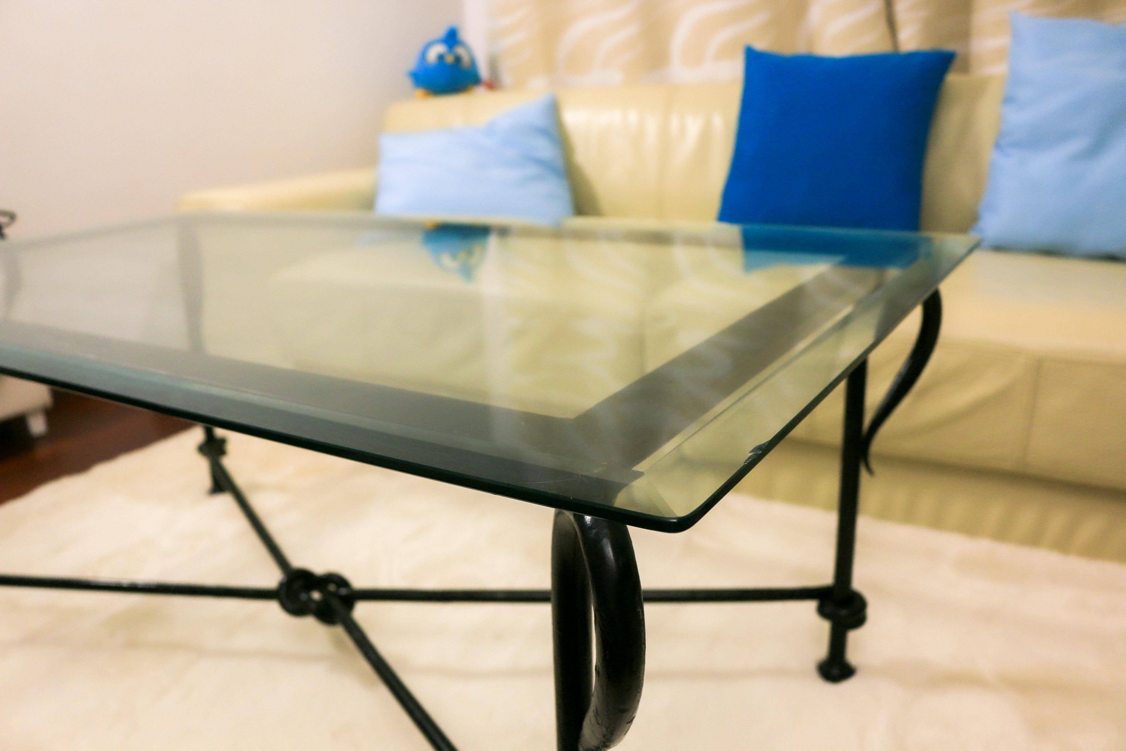 Table basse vintage – verre biseauté & fer forgé – 119×69×44 cm
