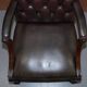 Gainsborough armchair George II leather Chesterfield hand-carved with claw and ball feet.
