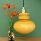 Suspension globe vintage en opaline ocre