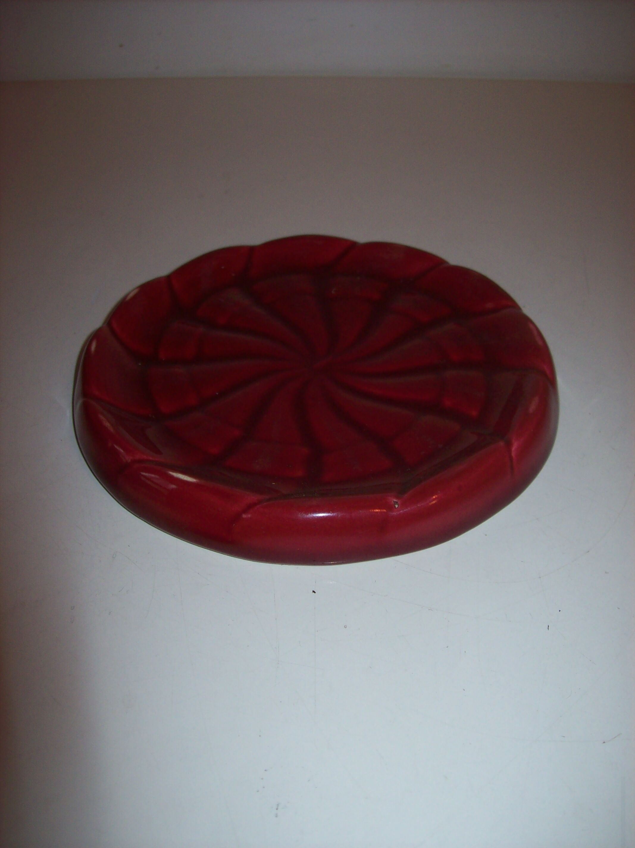 Ceramic under bottle