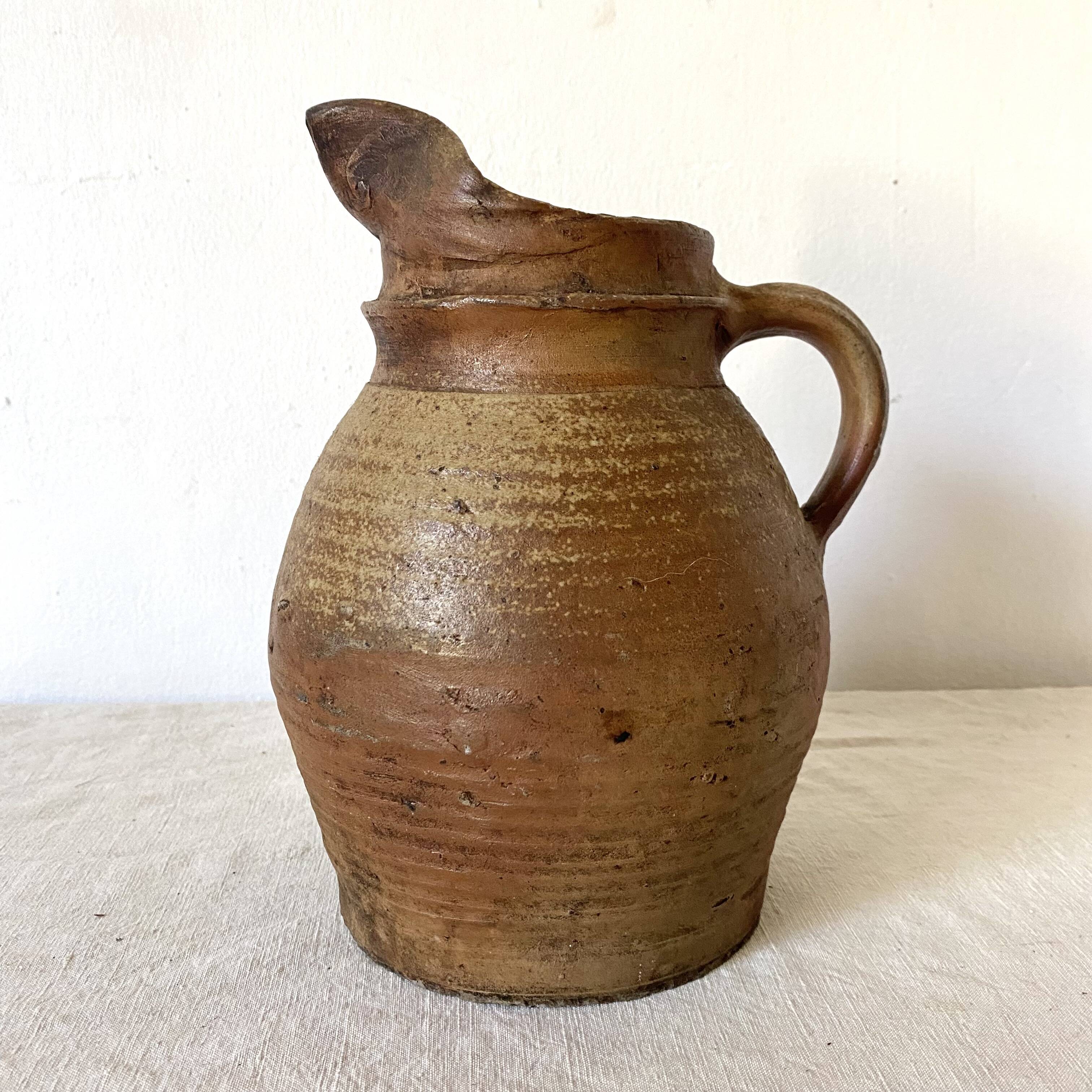 Antique terracotta pitcher