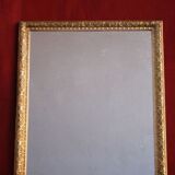 Miroir en stuc doré de style 67 x 52 cm