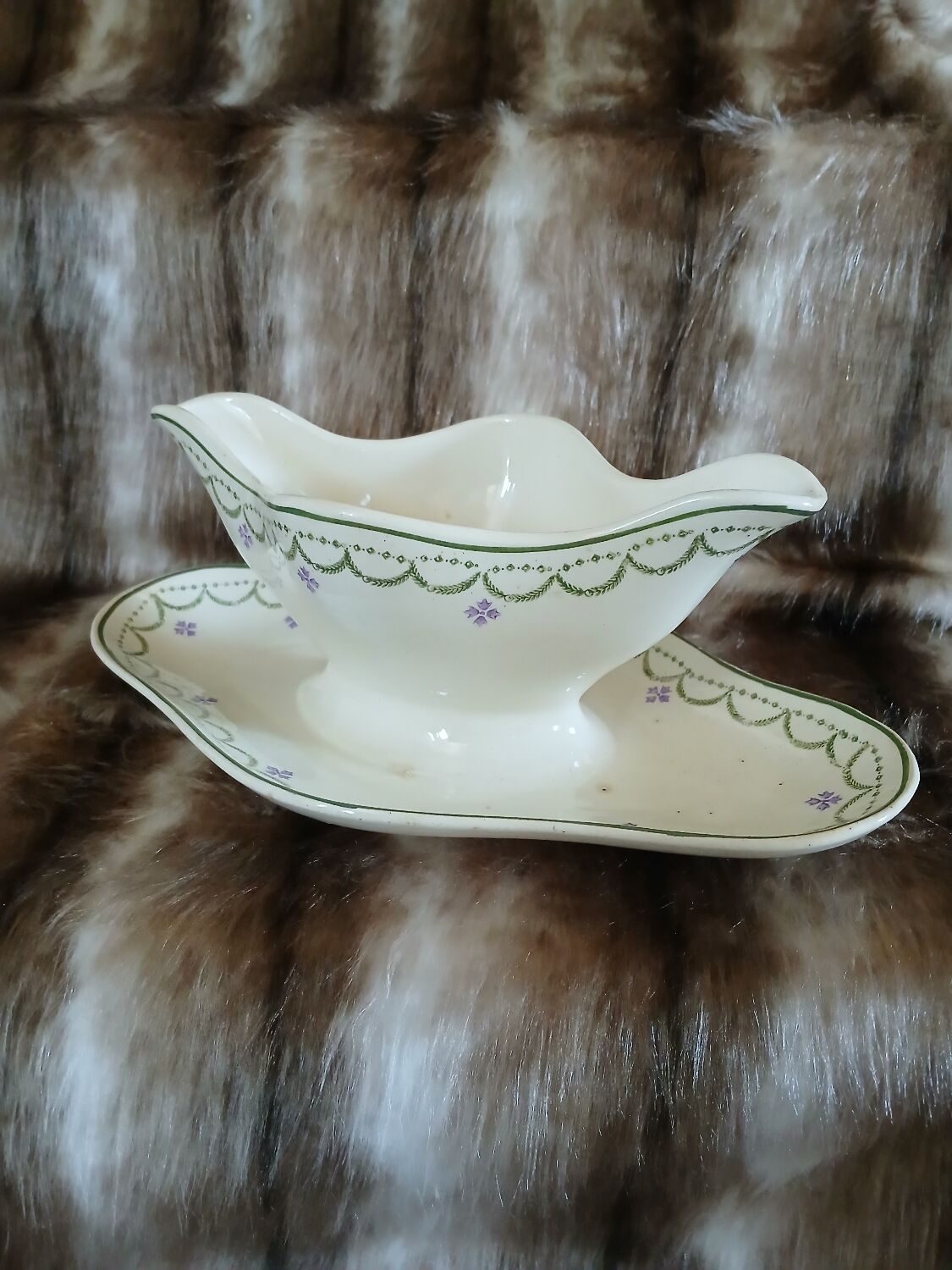 Antique sauce boat in Longwy ironstone.