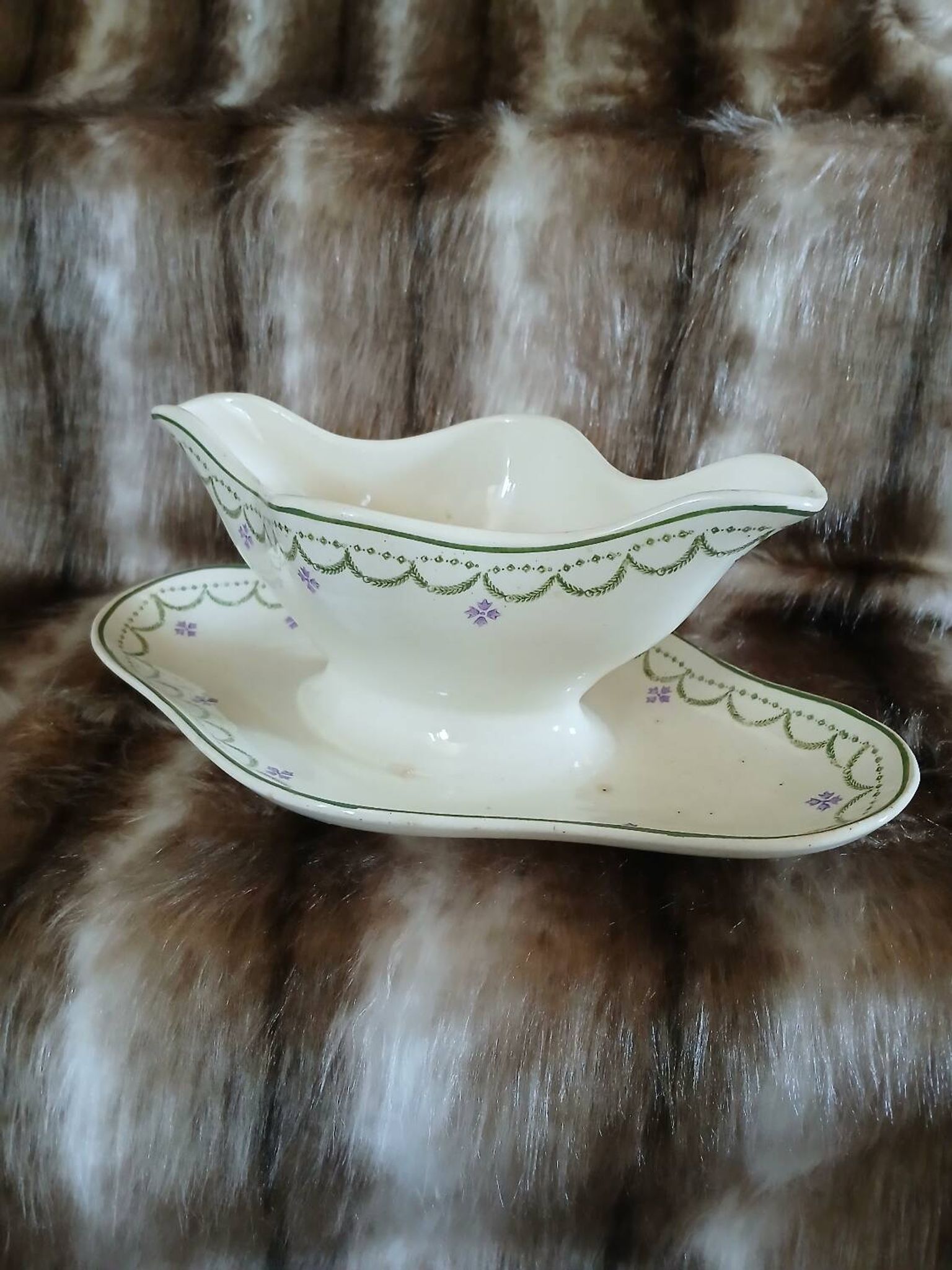 Antique sauce boat in Longwy ironstone.