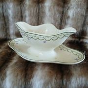 Antique sauce boat in Longwy ironstone.