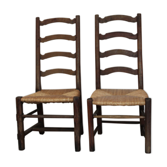 Pair of ancient mulched chairs