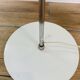 Chrome and white metal floor lamp, circa 1970.