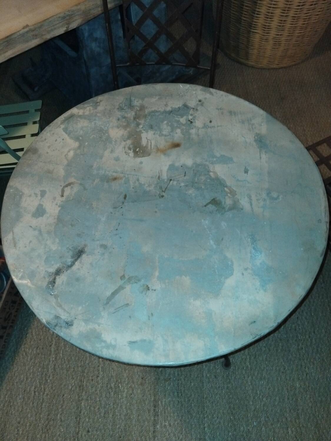 Wrought iron and zinc garden table