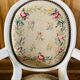 Upholstered armchair with cross-stitch in the Louis XVI style, 19th century.