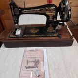 Ancienne machine à coudre Singer 27k