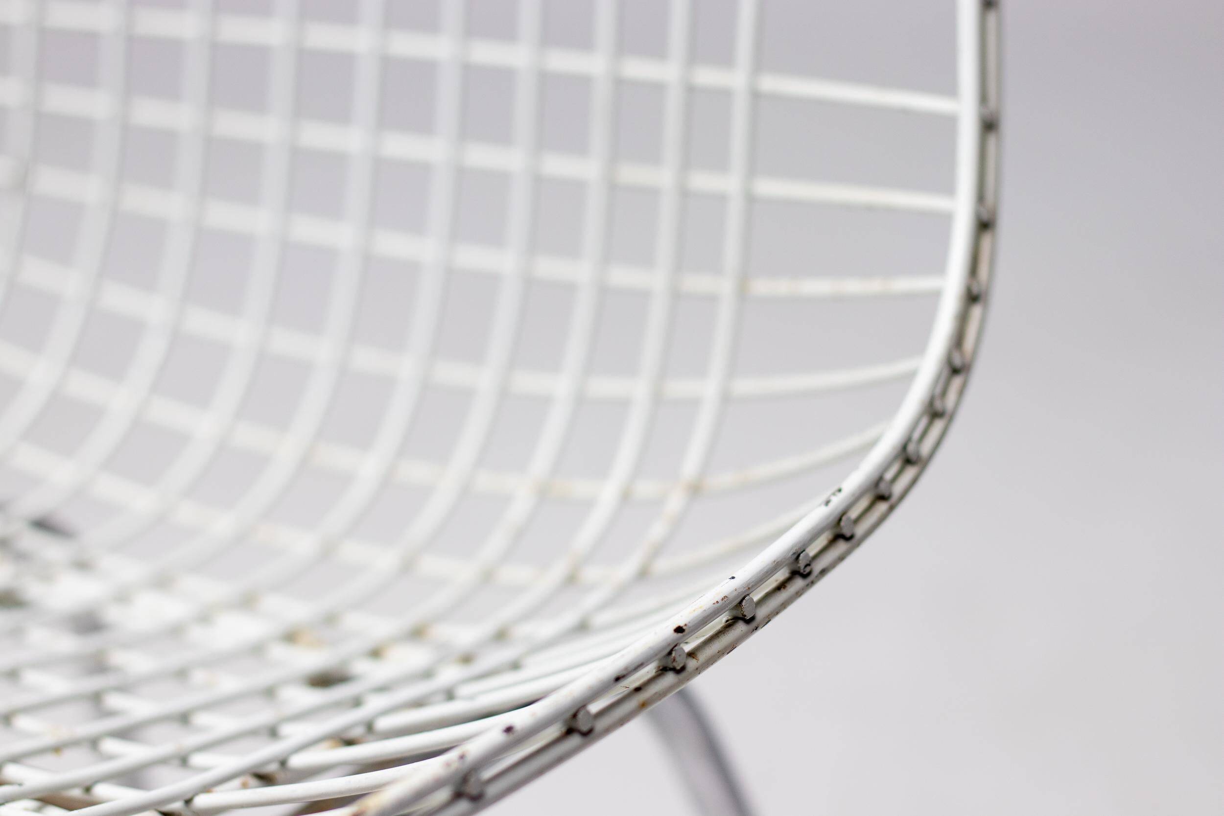 Set of 4 Eames wire chairs for Herman Miller with original Bikini seats by Girard.