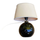 Vintage 80s table lamp with a black ceramic base and beige shade.