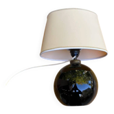 Vintage 80s table lamp with a black ceramic base and beige shade.