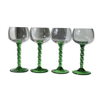 4 glasses of alsace white wine in twisted green foot blown glass