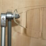 Metal and lucite folding chair, swivel backrest.