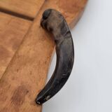 Wooden tray with ram horn handles
