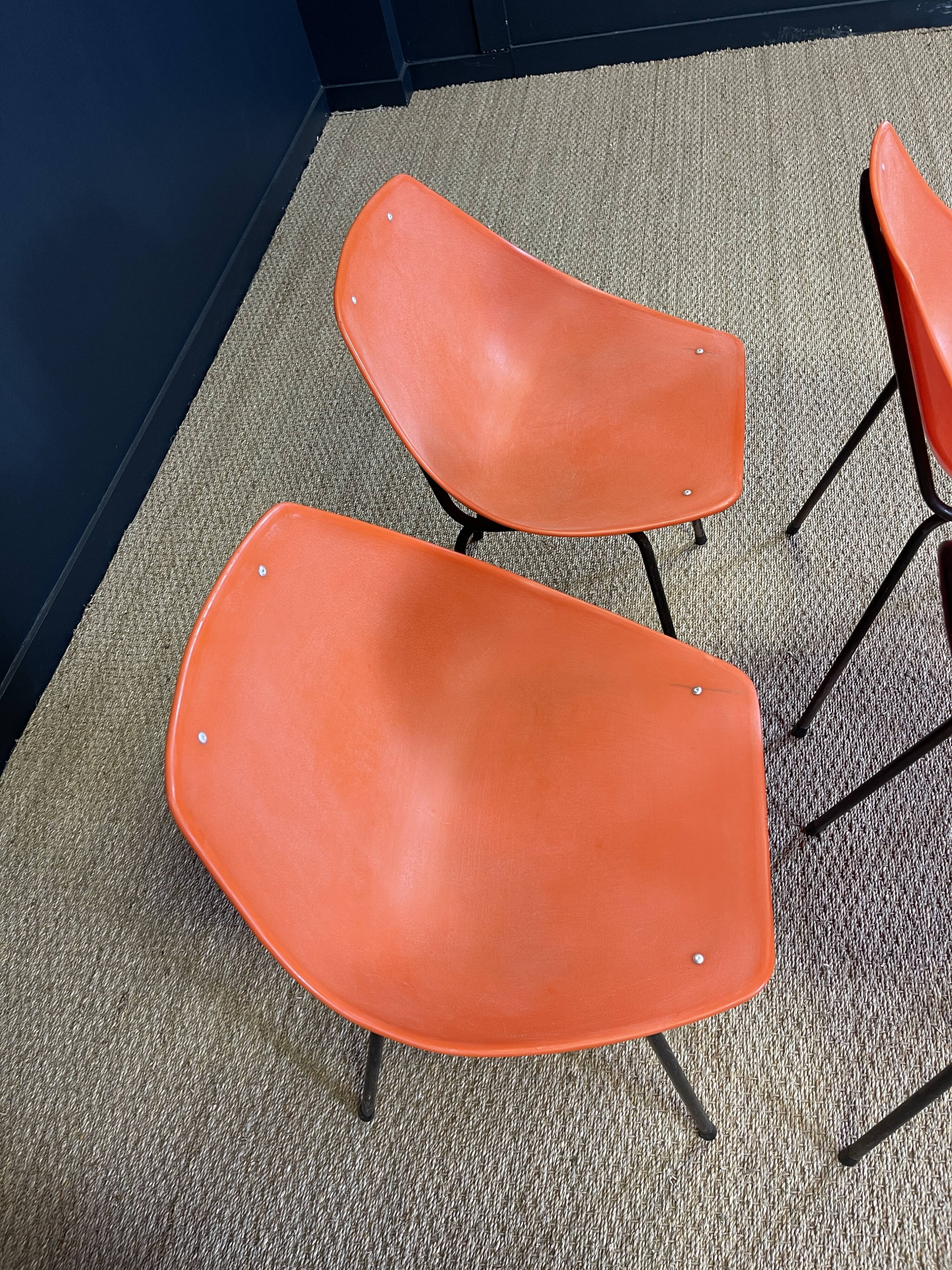Set of 4 orange Guariche chairs