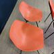 Set of 4 orange Guariche chairs