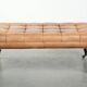Sheepskin ottoman/coffee table on wheels in English chesterfield style