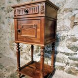 Antique French bedside table with a marble top.