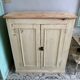 Beige patinated sideboard