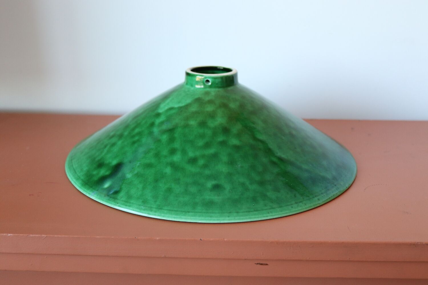 Two vintage green ceramic lampshades