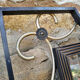 Forged iron mirror and gilded brass