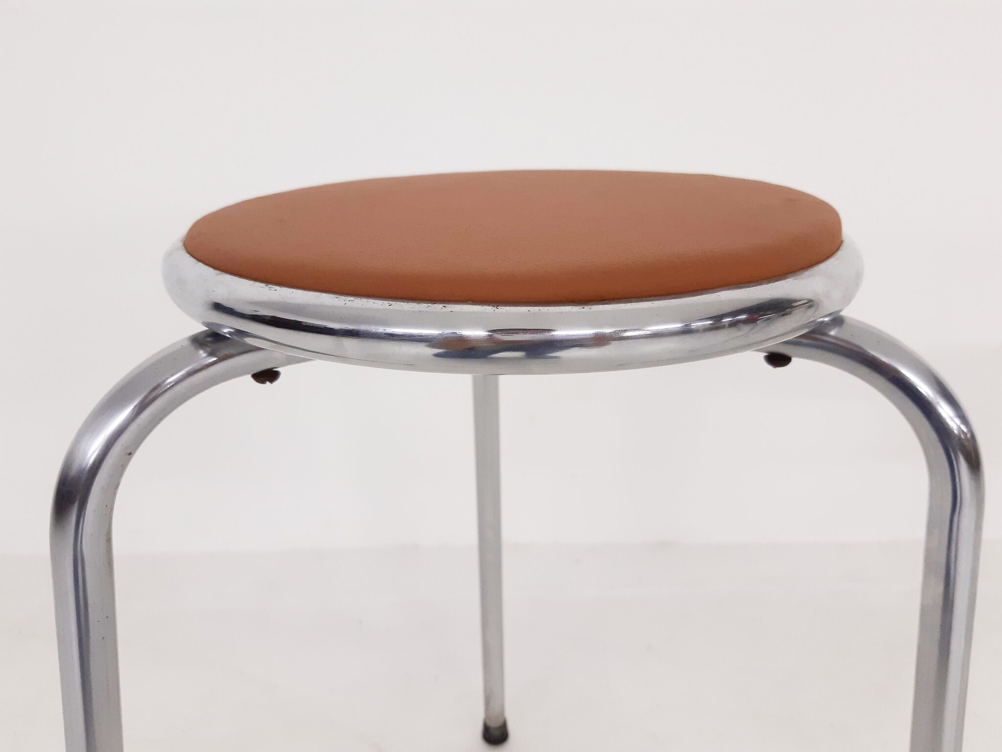 Set of 3 chrome stools with cognac leather seating, 1960's