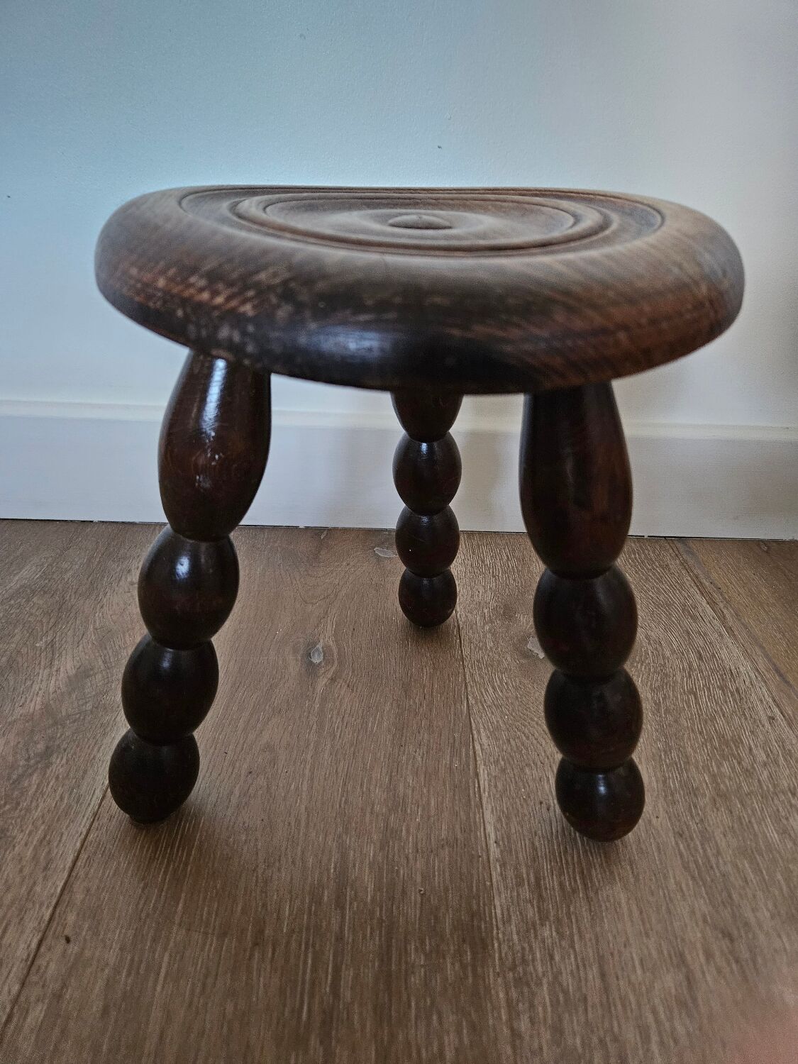Wooden tripod stool