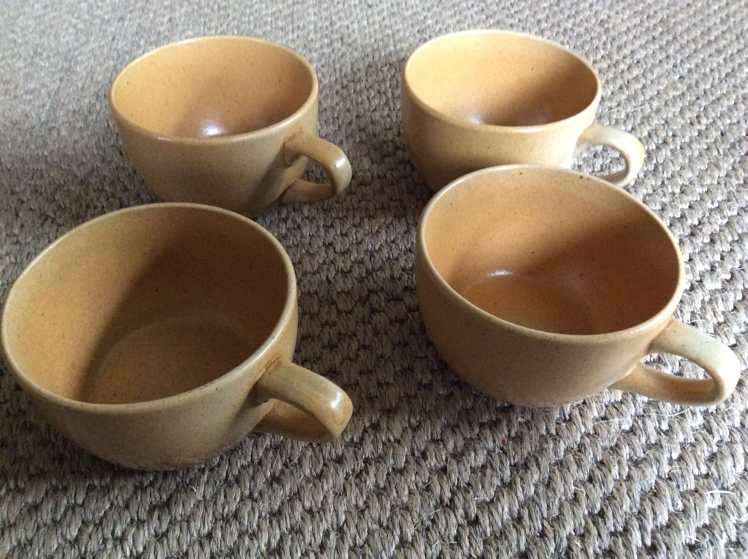 Series of 4 sandstone cups