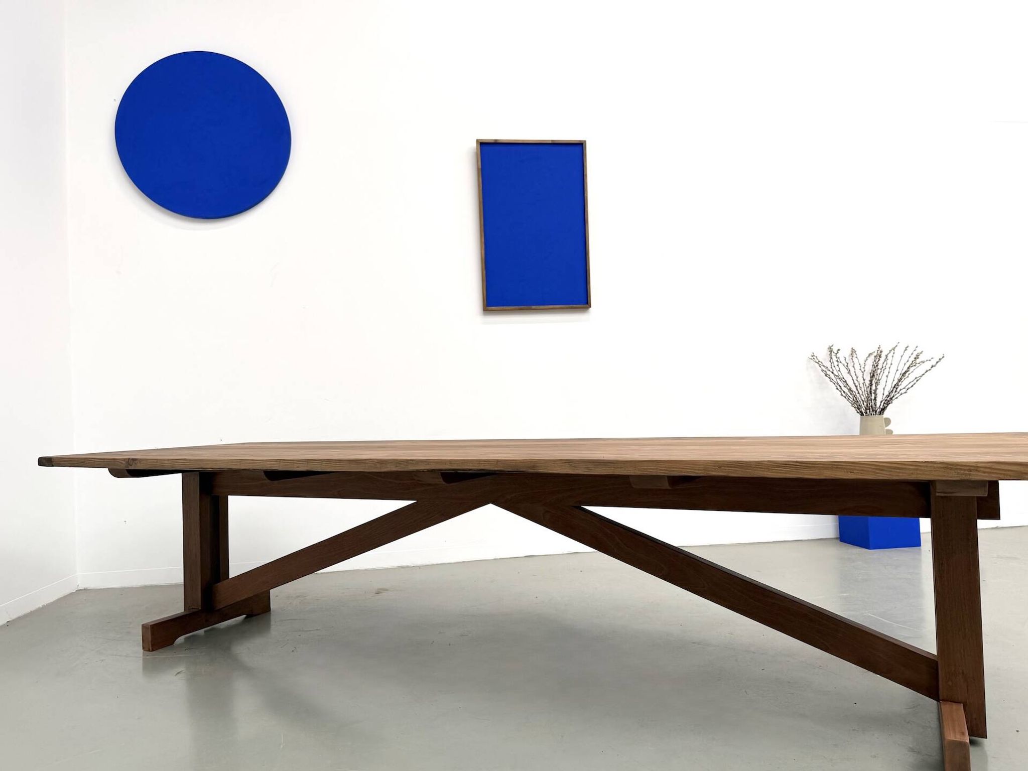 Refectory table in solid pine and beech, with X-shaped legs.