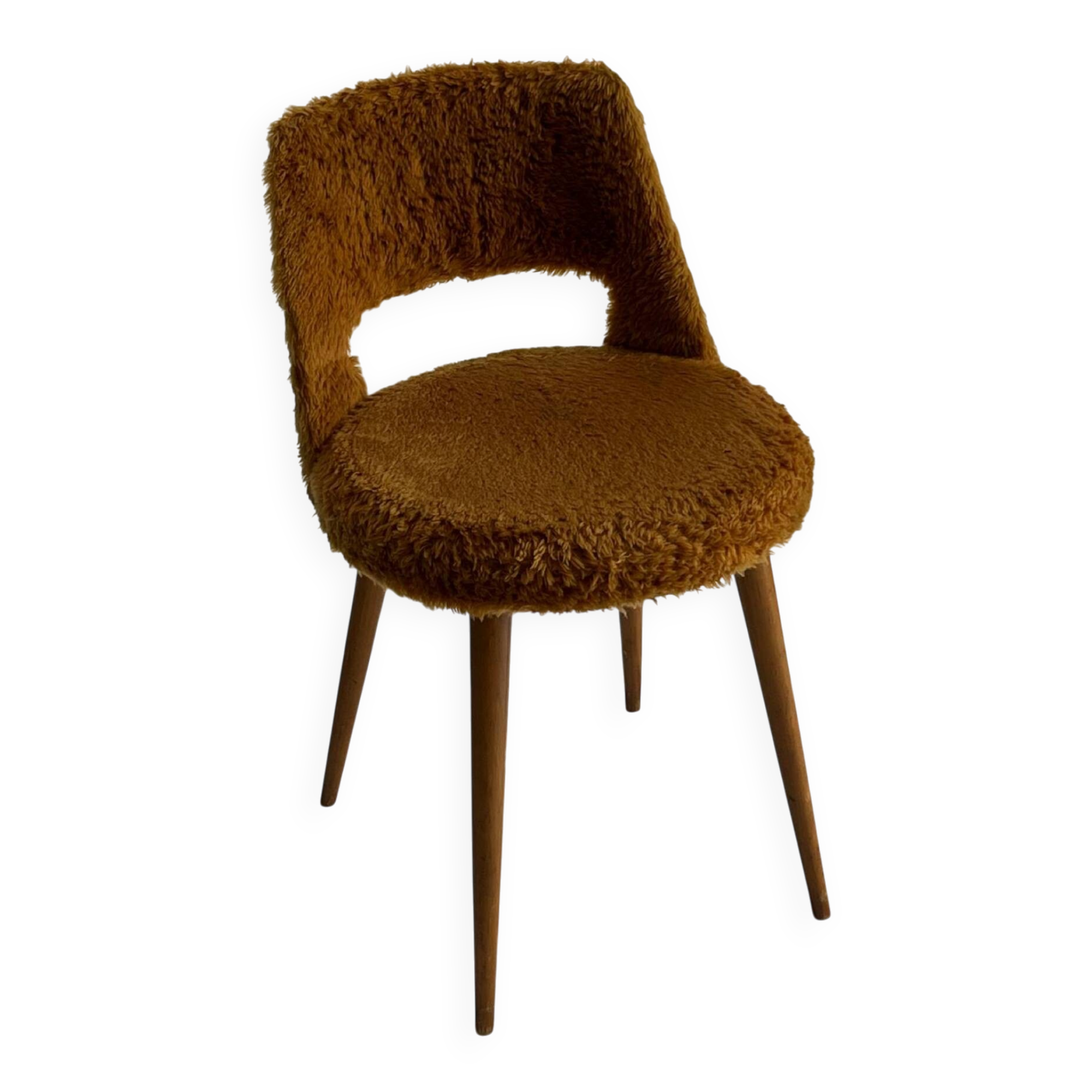 Camel barrel chair with faux fur by Baumann