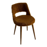 Camel barrel chair with faux fur by Baumann
