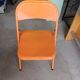 Vintage orange folding chair