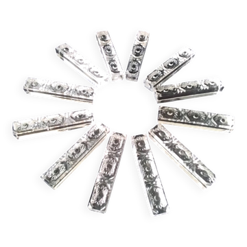Box of 12 rectangular crystal knife rests.