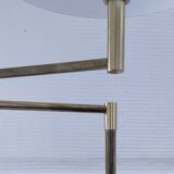 Articulated reading floor lamp in gold metal from the 90s