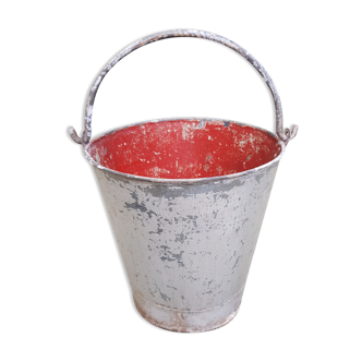 Old bucket with thick zinc handle and beautiful red patina