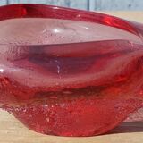 Empty pink blown glass pocket