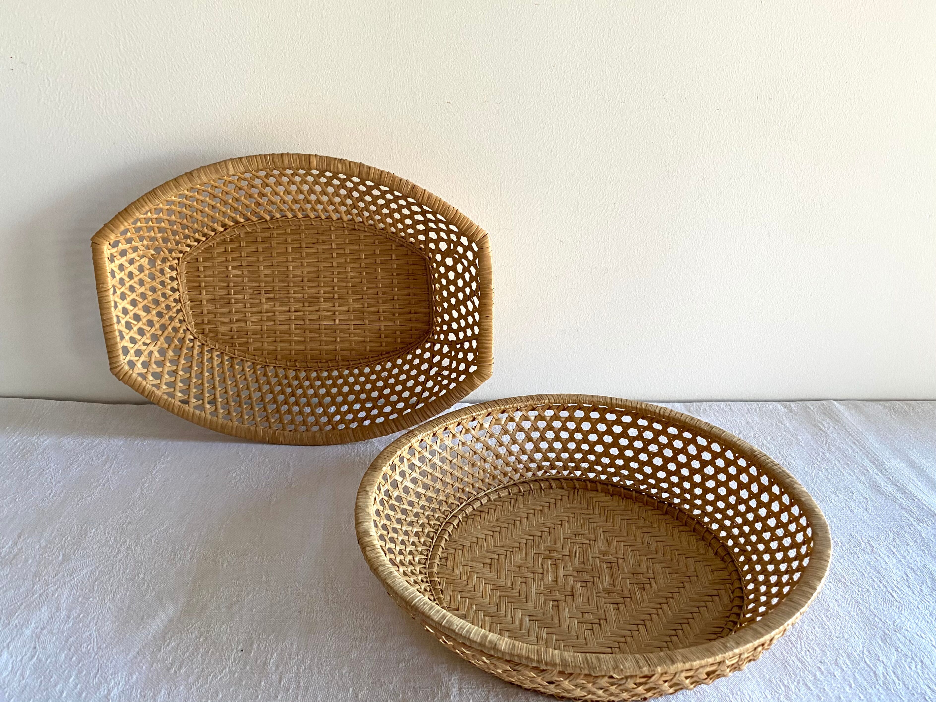 Pair of vintage braided rattan baskets