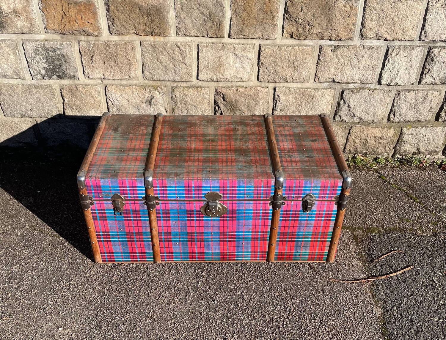 Old wooden and metal travel trunk