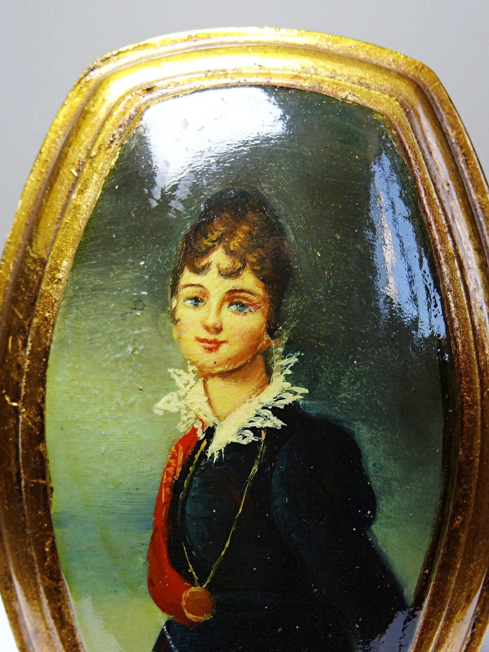 Small vintage Venetian oil on wood convex medallion portrait.